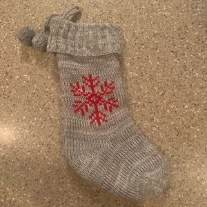 Gray and red knit Christmas stocking